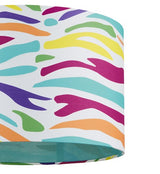 A zebra printed straight sided cylinder lampshade in fashion colours. The zebra stripes are printed in purple, yellow, green, orange, turquoise and fuchsia pink. The inside of the lampshade is lined in turquoise fabric.