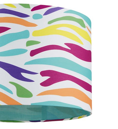 A zebra printed straight sided cylinder lampshade in fashion colours. The zebra stripes are printed in purple, yellow, green, orange, turquoise and fuchsia pink. The inside of the lampshade is lined in turquoise fabric.